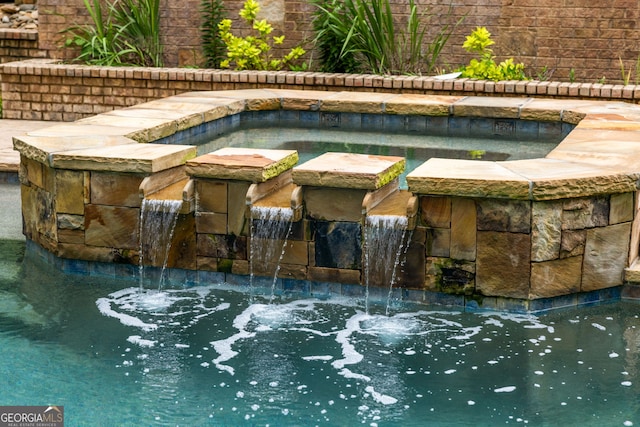 816 Blackfoot Trl, Suwanee, GA 30024 - view of swimming pool with an in-ground hot tub