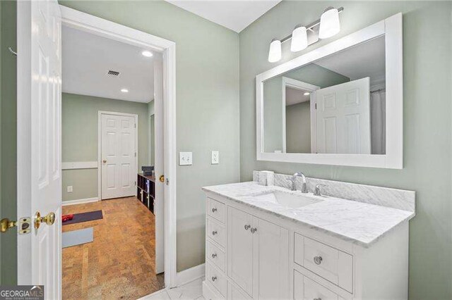4402 Windsor Oaks Chase, Marietta, GA 30066 - bathroom featuring vanity, baseboards, and recessed lighting