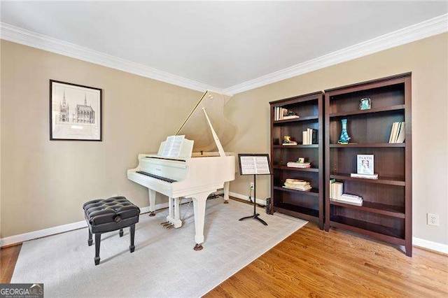 4402 Windsor Oaks Chase, Marietta, GA 30066 - living area featuring ornamental molding, wood finished floors, and baseboards