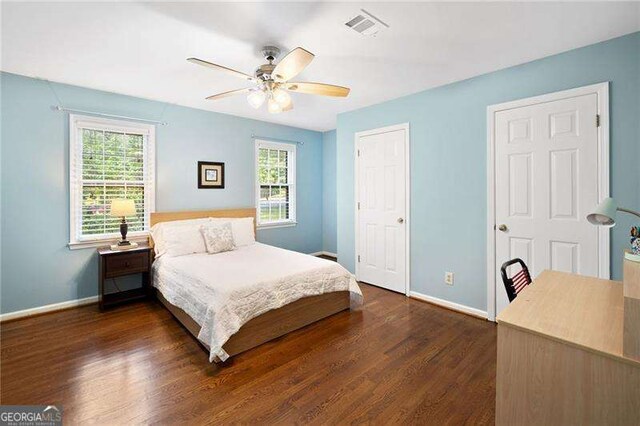 4402 Windsor Oaks Chase, Marietta, GA 30066 - bedroom featuring multiple windows, baseboards, dark wood-style flooring, and ceiling fan