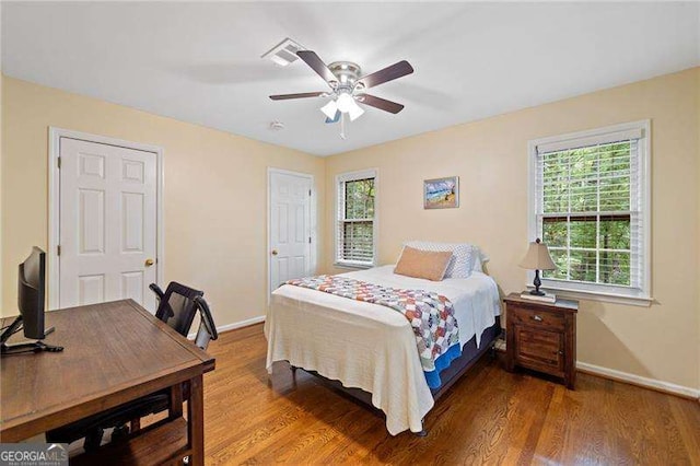 4402 Windsor Oaks Chase, Marietta, GA 30066 - bedroom featuring baseboards, multiple windows, and wood finished floors