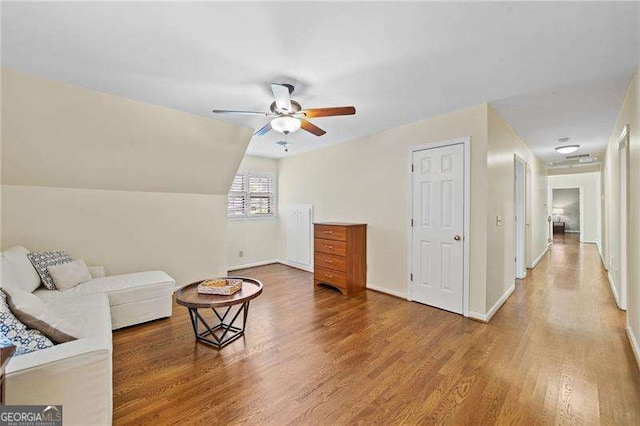 4402 Windsor Oaks Chase, Marietta, GA 30066 - living area featuring wood finished floors, ceiling fan, and baseboards