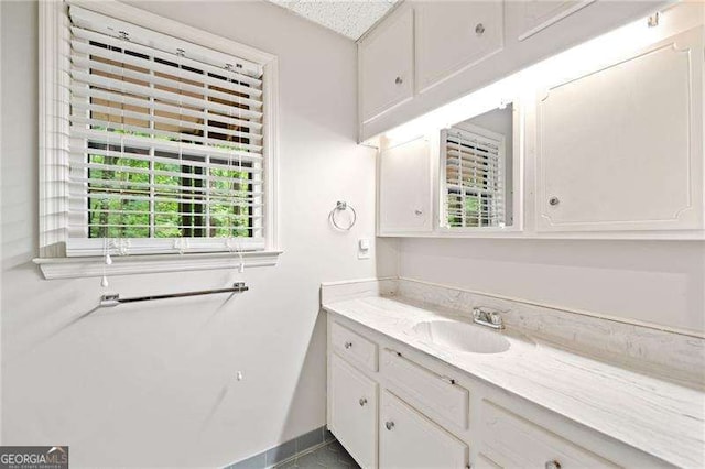 4402 Windsor Oaks Chase, Marietta, GA 30066 - bathroom featuring vanity and baseboards