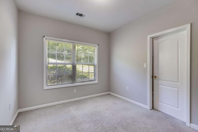 7712 Autry Cir Unit 701, Douglasville, GA 30134 - unfurnished room featuring light carpet and baseboards