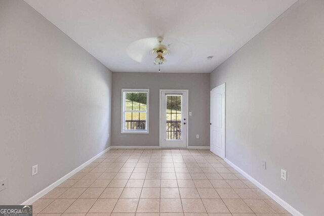 7712 Autry Cir Unit 701, Douglasville, GA 30134 - unfurnished room featuring a ceiling fan and light tile patterned flooring