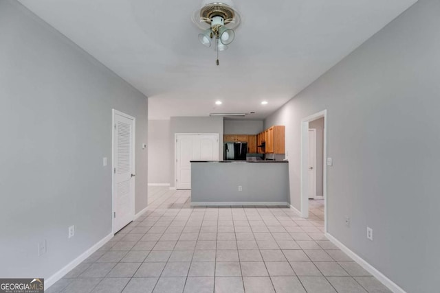 7712 Autry Cir Unit 701, Douglasville, GA 30134 - unfurnished living room with ceiling fan, baseboards, recessed lighting, and light tile patterned floors