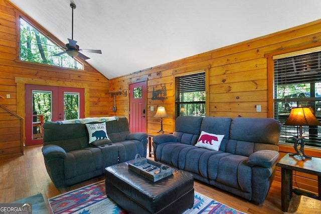 488 S Lemmon Ln Unit 289, Ellijay, GA 30540 - living area with a ceiling fan, hardwood / wood-style floors, wood walls, lofted ceiling, and french doors