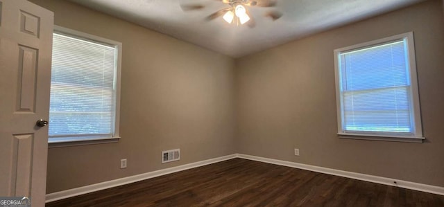 2663 Washington St NW, Atlanta, GA 30318 - unfurnished room featuring dark wood-style floors and a ceiling fan