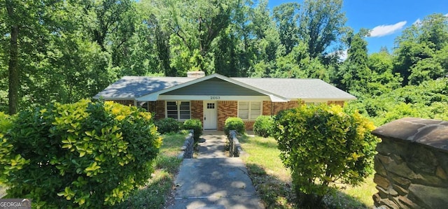 2663 Washington St NW, Atlanta, GA 30318 - view of front of property featuring a chimney and brick siding