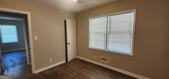 2663 Washington St NW, Atlanta, GA 30318 - spare room with dark wood finished floors and healthy amount of natural light