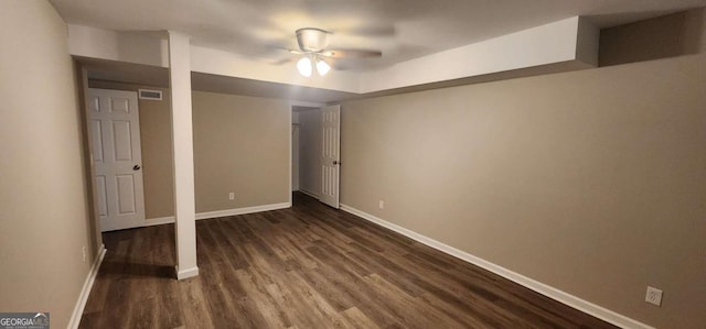 2663 Washington St NW, Atlanta, GA 30318 - unfurnished bedroom featuring dark wood finished floors, a closet, and a ceiling fan