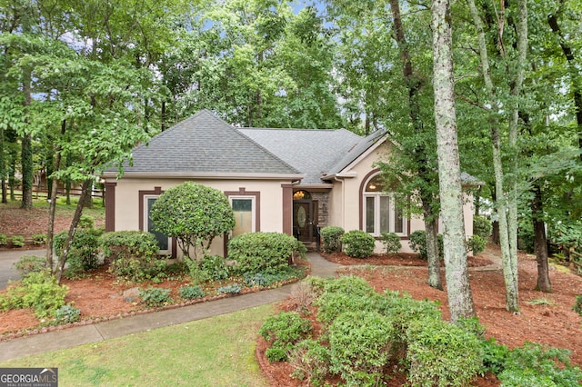 120 Bent Creek Dr, Woodstock, GA 30189 - view of front facade with stucco siding and a shingled roof