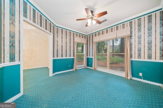 120 Bent Creek Dr, Woodstock, GA 30189 - empty room with a ceiling fan, crown molding, carpet, wallpapered walls, and baseboards
