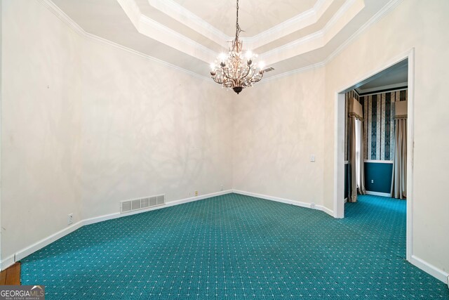 120 Bent Creek Dr, Woodstock, GA 30189 - carpeted empty room with a chandelier, crown molding, a tray ceiling, and baseboards