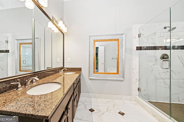 120 Bent Creek Dr, Woodstock, GA 30189 - bathroom featuring baseboards, marble finish floors, a marble finish shower, and double vanity