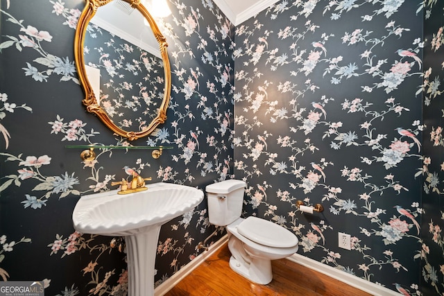 120 Bent Creek Dr, Woodstock, GA 30189 - bathroom with crown molding, wood finished floors, toilet, and baseboards