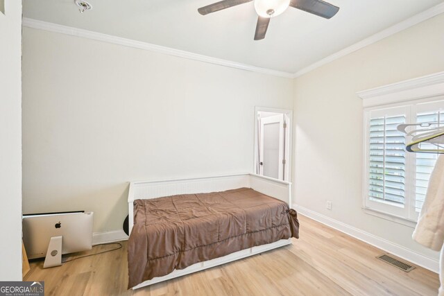999 Smith St SW, Atlanta, GA 30310 - bedroom featuring wood finished floors, crown molding, and ceiling fan