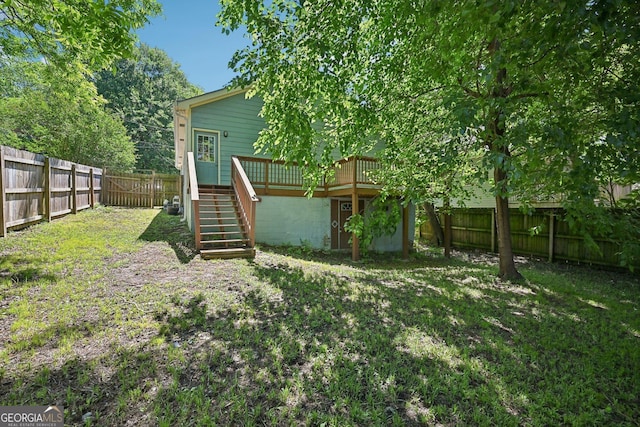 999 Smith St SW, Atlanta, GA 30310 - fenced backyard with stairs and a deck
