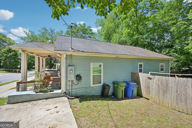 999 Smith St SW, Atlanta, GA 30310 - view of property exterior with a porch and a shingled roof