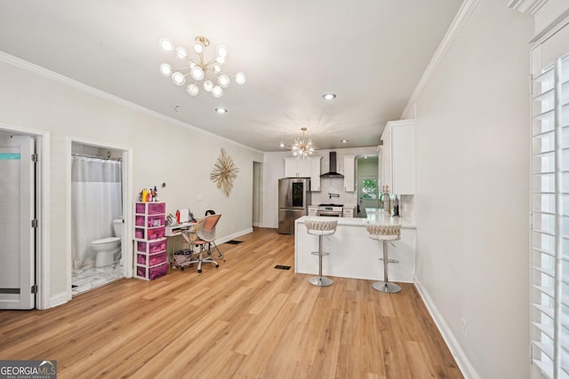 999 Smith St SW, Atlanta, GA 30310 - living room with a chandelier, light wood-style floors, ornamental molding, and recessed lighting