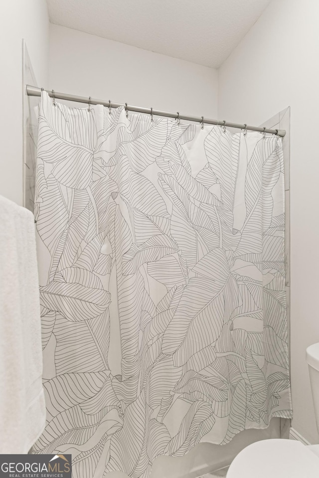 31 Bitter End Ct, Waverly, GA 31565 - full bathroom with toilet and a shower with shower curtain