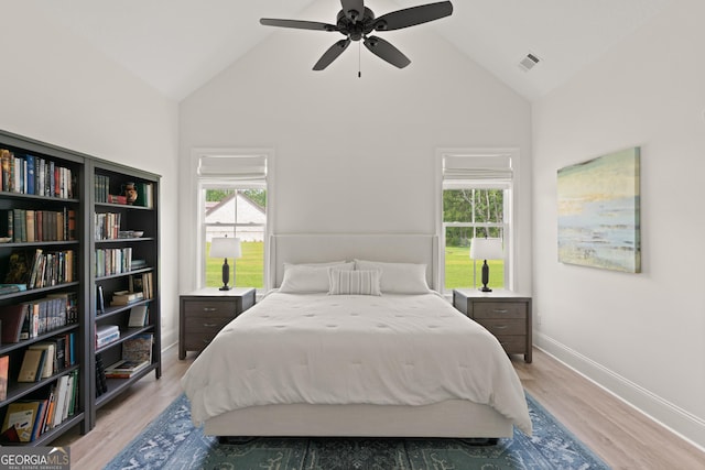 31 Bitter End Ct, Waverly, GA 31565 - bedroom featuring light wood-style floors, baseboards, high vaulted ceiling, and ceiling fan