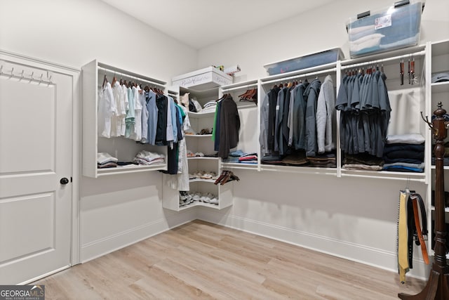 31 Bitter End Ct, Waverly, GA 31565 - walk in closet featuring wood finished floors