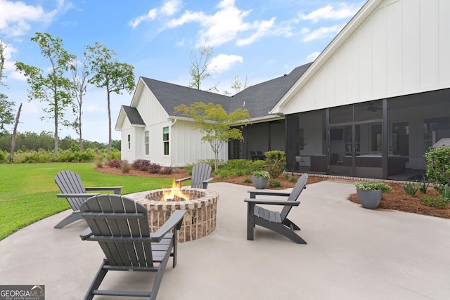 31 Bitter End Ct, Waverly, GA 31565 - view of patio / terrace featuring a fire pit and a sunroom
