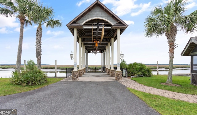 31 Bitter End Ct, Waverly, GA 31565 - surrounding community featuring a water view and a lawn