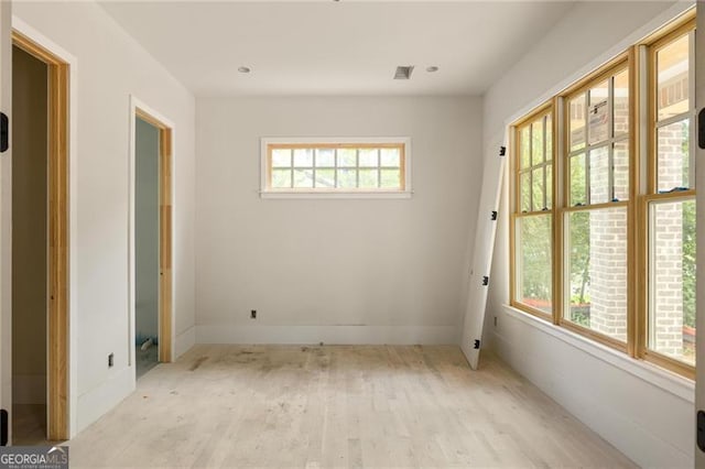 1115 Ralph Rd NE, Atlanta, GA 30324 - unfurnished bedroom featuring wood finished floors and baseboards