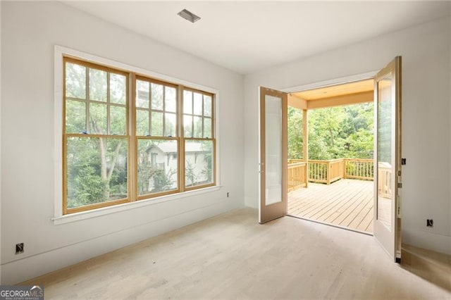 1115 Ralph Rd NE, Atlanta, GA 30324 - doorway with healthy amount of natural light and wood finished floors