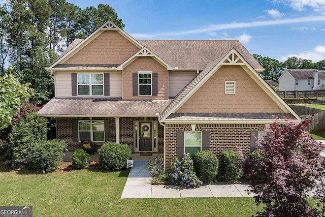 1148 Abe Lincoln Way, Jefferson, GA 30549 - craftsman-style house featuring covered porch, brick siding, and a shingled roof