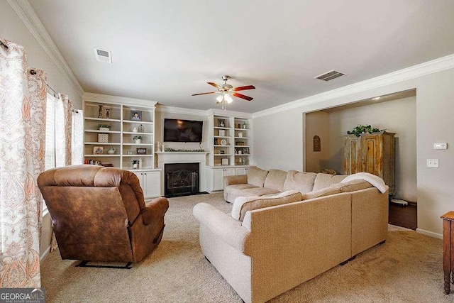 1148 Abe Lincoln Way, Jefferson, GA 30549 - living room featuring crown molding, a ceiling fan, light colored carpet, a fireplace with flush hearth, and baseboards