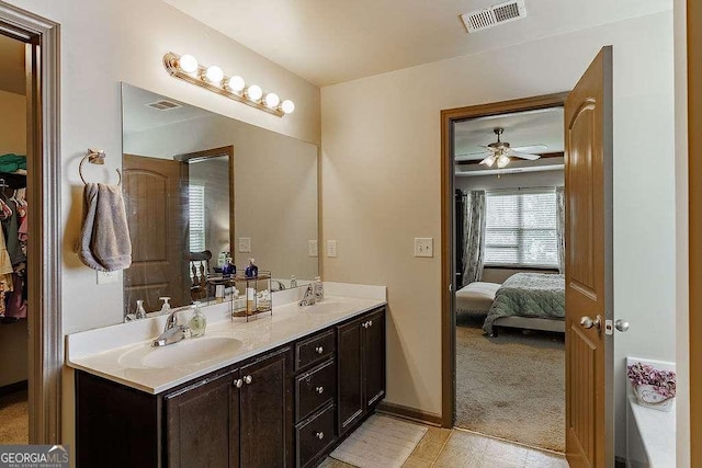 1148 Abe Lincoln Way, Jefferson, GA 30549 - full bath featuring double vanity, connected bathroom, a ceiling fan, and a spacious closet