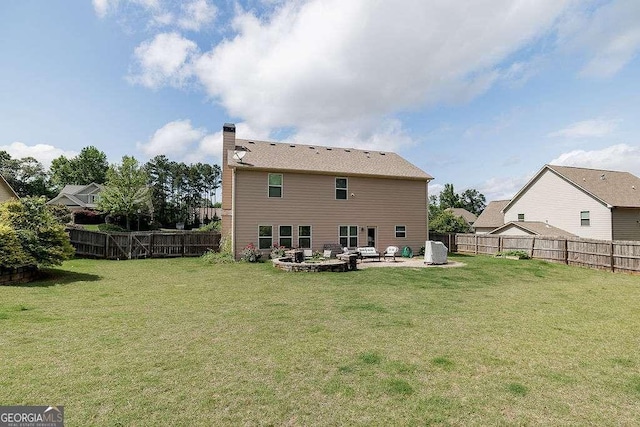 1148 Abe Lincoln Way, Jefferson, GA 30549 - rear view of property featuring a patio and a chimney