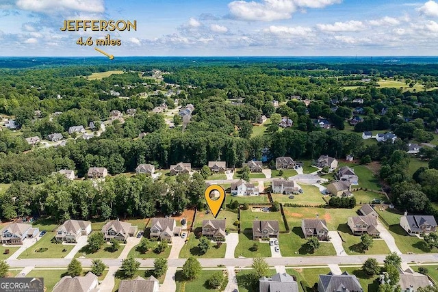 1148 Abe Lincoln Way, Jefferson, GA 30549 - aerial view of residential area featuring a heavily wooded area