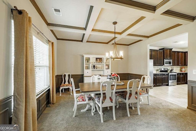 1148 Abe Lincoln Way, Jefferson, GA 30549 - dining space with coffered ceiling, light colored carpet, beamed ceiling, a chandelier, and a wainscoted wall