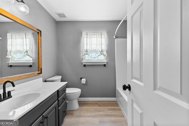 3 Stonebridge Way, Newnan, GA 30265 - full bath featuring vanity, toilet, bathing tub / shower combination, wood finished floors, and baseboards