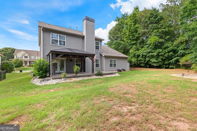 3 Stonebridge Way, Newnan, GA 30265 - rear view of house featuring a gazebo, a chimney, and a lawn