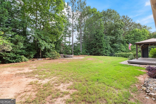 3 Stonebridge Way, Newnan, GA 30265 - view of grassy yard with a wooden deck and a gazebo