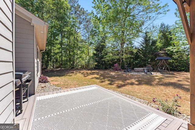 3 Stonebridge Way, Newnan, GA 30265 - view of grassy yard featuring a patio area and a fire pit