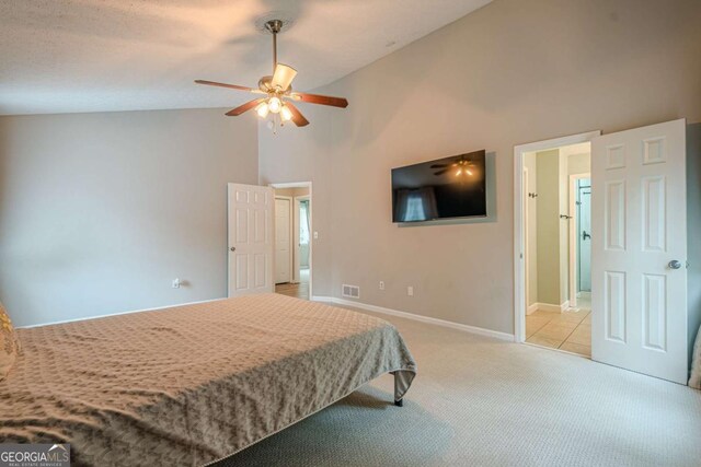 1137 Poplar Log Pl, Austell, GA 30168 - bedroom featuring light carpet, high vaulted ceiling, baseboards, and ceiling fan