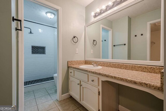 1137 Poplar Log Pl, Austell, GA 30168 - bathroom with a shower stall, vanity, tile patterned floors, and toilet