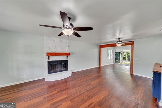 413 Panorama Pl, Macon, GA 31220 - unfurnished living room with a ceiling fan, a fireplace, and wood finished floors
