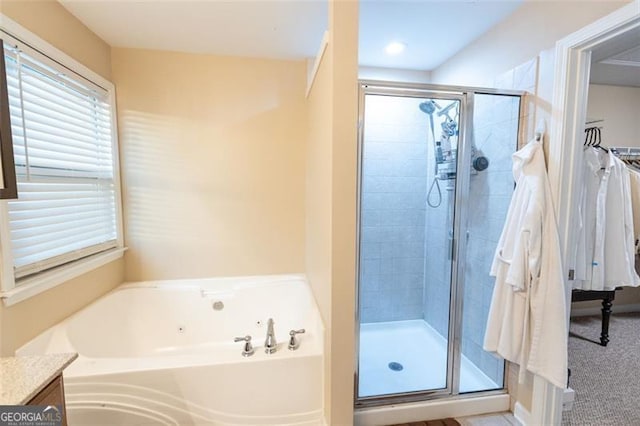 6089 Indian Wood, Mableton, GA 30126 - bathroom featuring a shower stall, a garden tub, and vanity