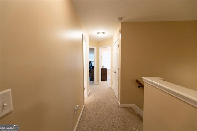 6089 Indian Wood, Mableton, GA 30126 - hallway featuring light colored carpet, an upstairs landing, and baseboards