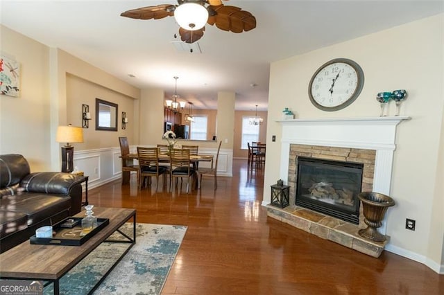 6089 Indian Wood, Mableton, GA 30126 - living area featuring a chandelier, a ceiling fan, wood finished floors, and a fireplace