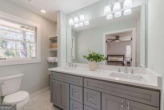 442 Mountain Park Trl, Stone Mountain, GA 30087 - full bath featuring double vanity, toilet, marble look tile flooring, and ensuite bath