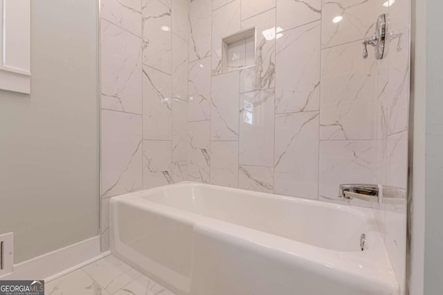 442 Mountain Park Trl, Stone Mountain, GA 30087 - bathroom with marble look tile flooring and shower / bathtub combination