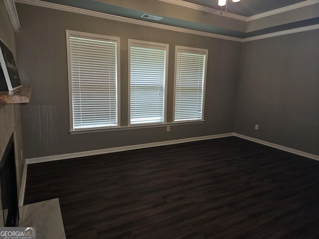 536 Longwood Pl, Dallas, GA 30132 - unfurnished living room with dark wood-style floors, a high end fireplace, crown molding, and a ceiling fan